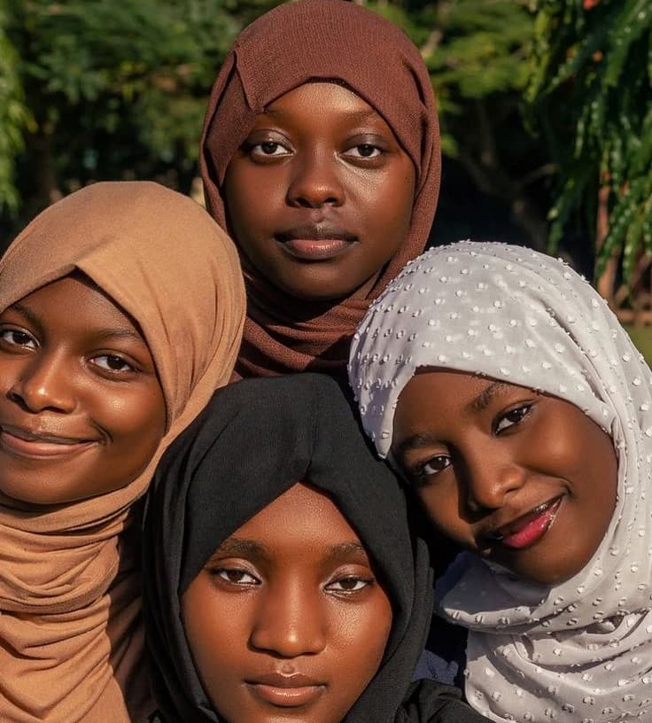 Close rage shot of four Muslim northern Nigerian women
